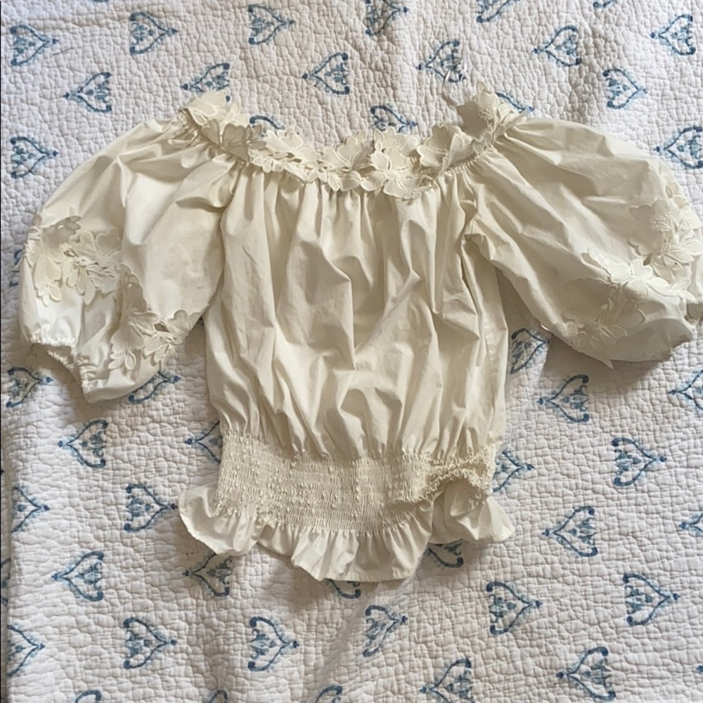 Beautiful off the shoulder blouse with flowers